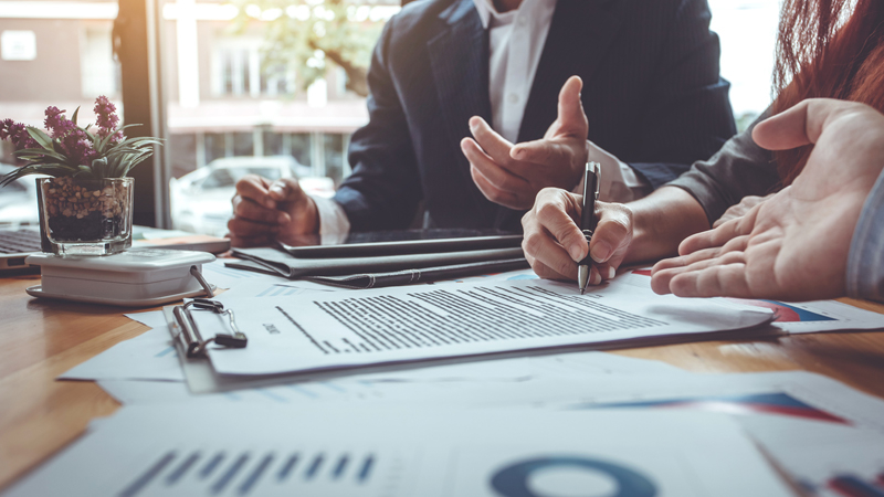 A financial advisor meeting with a client