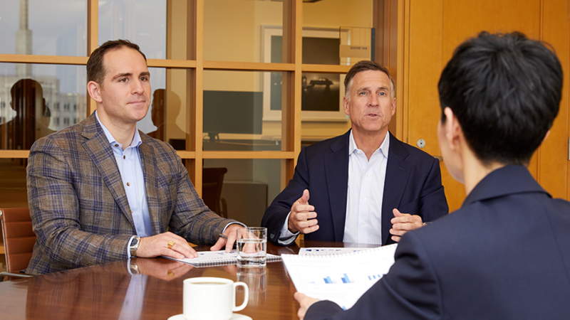 Dodge & Cox Private Client Team members meeting with a client